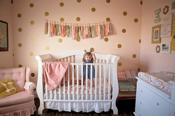 Little Ivy’s Gold and Pink Nursery